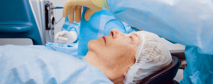Elderly lady having eye surgery