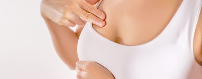 Woman performs a self examination