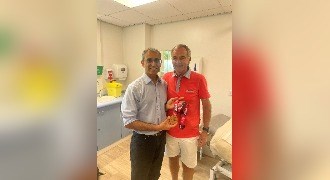 Local patient shows his gratitude by presenting surgeon with London Marathon medal