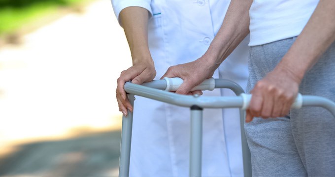 A person uses a walking aid